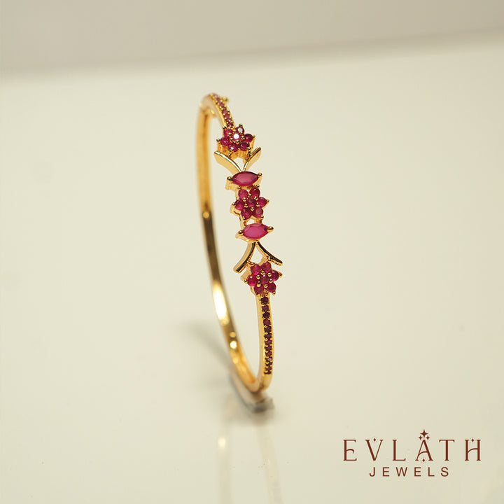 Premium Gold-Plated Bangles with Ruby Stone Detailing, Adjustable Fit - Evlath Jewels.