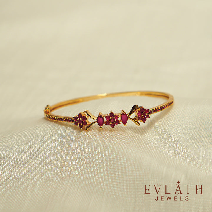 Premium Gold-Plated Bangles with Ruby Stone Detailing, Adjustable Fit - Evlath Jewels.